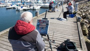 Thomas Freund bei der Plein Air Malerei imit Öl im Hafen von Kühlungsborn (c) Frank Koebsch (1